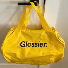 Brand New - Never Used Comes With Removable And Adjustable Shoulder Strap One Compartment Glossier Tote Bag, Betty Boop Handbags, Glossier Bag, Pink Makeup Bag, Time Routine, Fringe Handbags, Yellow Handbag, Utility Bag, Monogram Handbag