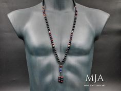 Lapis Lazuli 108 Mala Necklace with Red Agate, Tassel, Black Onyx Beads, and Silver Hematite - Yoga, Buddhist Meditation, Jewelry Gifts The handmade necklace is made of a lapis lazuli and agate stone tassel, 8 mm natural lapis lazuli, red agate, and black onyx beads, 4mm onyx beads, 7*14 lapis lazuli stone, 10 mm hegzonal lapis lazuli stone, 6 mm silver hematite stone. All finished with nylon cord.  - The Mala 36 Inc ( Size = 108 Mala Bead ) - The products are custom-made and done of their kind. Handmade Black Mala As Gift, Black Beaded Mala As A Gift, Black Beaded Mala As Gift, Artisan Black Necklace With 108 Beads, Artisan Black Necklaces With 8mm Beads, Artisan Black Necklace With 8mm Beads, Traditional Black Beaded Necklaces With Natural Stones, Traditional Black Beads With Natural Stones, Buddhist Meditation