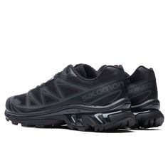 Originally released in 2013, the XT-6 from Salomon is introduced in the latest colorways while honing in on all of its signature attributes. Made for long-distance events and rough conditions, the rubber outsole is designed with a rigid finish while protecting the inner workings of the EVA cushioning. A blend of textile and synthetic fibers is incorporated within the upper for a breathable and comfortable fit. Synthetic and textile upper Rubber outsole EVA cushioning TPU film Lightweight Embosse Airport Travel, G Shock Watches, Shoe Inspo, Puma X, New Mobile, Us Man, Black Sneakers, Black Box, Nike Air Max 90