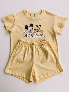 short sleeve mickey set Fitted Cotton Cartoon Print Sets, Summer Cotton Mickey Mouse T-shirt, Mickey Mouse Cotton T-shirt For Summer, Summer Mickey Mouse Cotton T-shirt, Cute Yellow Short Sleeve Clothing Sets, Playful Yellow Short Sleeve Sets, Cute Yellow Short Sleeve Sets, Cute Yellow Sets With Short Sleeves, Cute Yellow Set With Short Sleeves