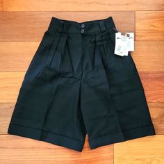 Nwt Vintage Jones New York Black High-Waisted Knee-Length Shorts With Hem Fold. Size 2p. Button And Zip Front Closure. Two Deep Side Pockets (Now Hard To Find). Single Right Back Pocket With Button Closure. Never Been Worn. Includes Extra Button For Mending, If Needed. Make Me An Offer Or Ask Me More Questions Below! High Waist Bermuda Shorts With Pockets, Chic Fitted High Waist Bermuda Shorts, High Waist Workwear Shorts For Spring, High-waisted Workwear Shorts For Spring, High Waist Shorts For Spring Workwear, Black Bermuda Shorts For Workwear In Summer, Chic High Waist Bermuda Shorts For Work, Solid Color Short Leg Bottoms For Work, High-waisted Solid Bermuda Shorts For Workwear