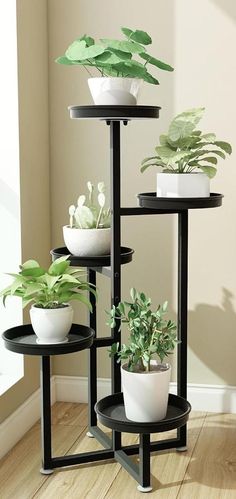 three tiered plant stands with plants in them