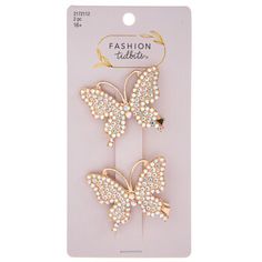 Let natural beauty take over your hair when you accessorize with these Rhinestone Butterfly Hair Clips! These metal alligator-style clips have a shiny gold finish and butterfly-shaped tops. The butterflies are angled diagonally and are covered in lots of iridescent rhinestones. Nobody will be able to look away from these dazzling butterflies! Dimensions: 	 Length: 2" 	 Width: 2" 	 Thickness: 1/2" Card contains 2 hair clips. Wearable Art Fashion, Butterfly Hair Clips, Alligator Hair Clip, Butterfly Decor, Butterfly Hair Clip, Home Supplies, Butterfly Decorations, Butterfly Hair, Elegant Christmas