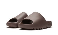 The adidas Yeezy Slide “Soot” is an easy-on, easy-off footwear option dressed in an earthy brown hue.  Dubbed “Soot,” this Yeezy Slide is a Fall 2020 release that displays a futuristic appearance.  Built entirely of lightweight yet durable EVA foam, the sandal features a midfoot arch that stabilizes the foot.  The ridged outsole provides grip on slippery surfaces.  Release date: September 4, 2020. Meds For Dogs, Shark Shoes, Adidas Shoes Yeezy, Adidas Yeezy Slide, Yeezy Slides, Jewelry Fashion Trends, Dream Shoes, Adidas Yeezy, Kanye West