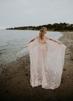 Celestial inspired sheer blush pink gown with adjustable drawstring. Delicate pink hand beaded frills, slightly short on the sides with a sweep train on the back. Has more of soft pink tone. Does not include a bodysuit. Sequin Dress Photoshoot, Wedding Dress Maternity, Celestial Dress, Maternity Dresses For Baby Shower, Maternity Long Dress, Dress Photoshoot, Ethereal Dress, Pink Gown, Maternity Dresses For Photoshoot