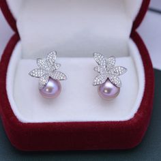 9-10mm Purple Freshwater Pearl & Floral Stud Earrings #pearls #pearllovers #pearlsforgirls #goldensouthseapearls #PearlNecklace #pearlsdaily #Akoyapearls #pearlsaregirlsbestfriend #realpearls #jewelrygram Elegant Purple Pearl Earrings For Anniversary, Elegant Silver Pearl Flower Earrings, Elegant Pink Cubic Zirconia Flower Earrings, Silver Pearl Drop Earrings In Flower Shape, Pink Elegant Flower Earrings For Anniversary, Elegant Silver Flower-shaped Pearl Earrings, Elegant Purple Pearl Earrings, Formal Pearl Flower Shaped Earrings, Elegant Purple Pearl Earrings For Formal Occasions