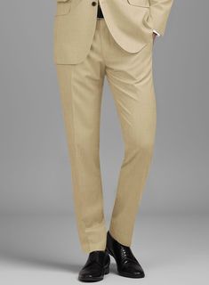 Sophisticated and extremely functional, our Stretch Beige Wool pants maintain a sharp aesthetic from your morning coffee to evening cocktails. Crafted from wool polyester and lycra blend, the classic beige color and smooth feel of the pants are perfect combination for a stylishly refined cold weather look that is timeless and comforting. Wear it with a matching jacket and waistcoat, a crisp white shirt, pink patterned tie and dark brown oxford shoes. 
 
 Look Includes  Stretch Beige Wool Fabric  Cross Pocket  Flat Front  Two Welted Back Pockets on Trousers   You can change the look during customization if required. 
 
 Lining: Viscose, Dry Clean. Dark Brown Oxford Shoes, Sharp Aesthetic, Tan Brogues, Evening Cocktails, Grey Wool Suit, Blue Linen Shirt, Brown Oxford Shoes, Brown Corduroy Jacket, Fabric Cross