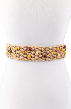 Add a flourishing touch to any look with this ornate belt knotted from raffia straw and embellished with multicolored beads and smooth leather trim. Raffia straw with leather trim Imported Beige Woven Belts For Spring, Spring Beige Woven Belt, Beige Woven Belt For Vacation, Casual Woven Belts For Spring, Adjustable Brown Belts For Beach, Adjustable Woven Beige Belt, Adjustable Belts For Summer Vacation, Adjustable Summer Vacation Belt, Adjustable Woven Belt For Summer