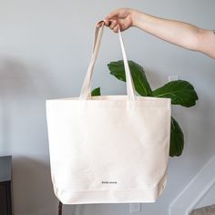 This printed tote is your perfect bag for thrifting, farmer’s markets, and more. Featuring original art and a 5” gusset, it’s both functional and fun. Designed by Lindy, made and printed in the U.S. using 100% cotton. Each tote is approximately 15” x 19” with a 5” gusset (the part that folds out at the base). The straps hang ~12” from your shoulder. Large Natural Canvas Bag For Everyday Use, Large Natural Canvas Bag For Daily Use, Large Everyday Canvas Bag, Large Canvas Bag For Daily Use, White Cotton Canvas Bag With Removable Pouch, Canvas Tote Bag With Cotton Gusset, Cotton Canvas Bag With Gusset For Everyday Use, Eco-friendly Canvas Bag With Removable Pouch For Everyday Use, Eco-friendly Everyday Canvas Gift Bag