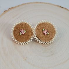 These pink flower and  cream seed bead leather earrings are perfect to wear all day without noticing them. They are very lightweight. Perfect little statement pieces to add to your collection! Handmade Beige Flower Earrings As Gift, Handmade Beige Flower Earrings For Gift, Handmade Beige Flower-shaped Earrings, Beige Flower Earrings For Gift, Beige Flower-shaped Earrings For Gift, Handmade Cream Flower Earrings, Flower Beaded Earrings, Antler Beads, Antler Earrings