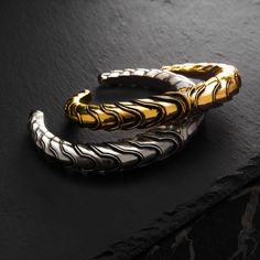 The ARKANE cuff bracelets have an ultra-structured style, perfect for both men and women. These cuffs are not only elegant but also spectacular, with subtle luxury making them a perfect style accessory. Introducing our remarkable Unisex Cuff Bracelet collection - a symbol of versatile elegance. Elevate your style quotient with our Adjustable Brass Bracelet, embodying avant-garde jewelry. Discover timeless charm with our Antique Bangle Bracelet and the sleek sophistication of our Silver Cuff Brac Luxury Adjustable Antique Cuff Bracelet, Luxury Antique Adjustable Bangle, Bracelet For Him, Avant Garde Jewelry, Subtle Luxury, White Brass, Jewelry Antique, Brass Bracelet, Perfect Style