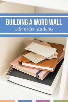 books stacked on top of each other with text overlay reading building a word wall with older students