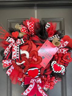 a valentine's day wreath on the front door