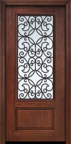 a wooden door with wrought iron grills on the side and glass paneled in