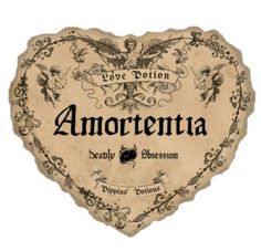 an old - fashioned heart shaped sign with the word amorenta written in it