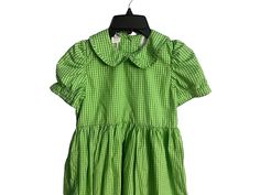 Vintage green and white girl's dress, tag says Oriental Express, sz 8, 55% cotton, 45% polyester. Dress buttons in the back, has puffed sleeves, 2 layers, has belt loops but no belt. Dress is in great condition. Green Short Sleeve Dress For Formal Occasions, Green Cotton Dress For Dress-up, Casual Green School Dresses, Green Casual School Dress, Girls Green Dress, Girl Green Dress, Platform Wedges Shoes, Girls White Dress, Dress Buttons