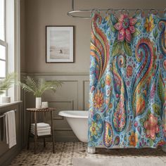 a bathroom with a bathtub, shower curtain and rug