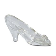 a clear high heeled shoe with a crystal heart on the toe and an embellished buckle