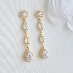 Crystal Clip-on Dangle Drop Earrings for Weddings Beautifully crafted with cubic zirconia these clip-on dangle earrings are available in three finishes of silver, 14K gold, and rose gold plating. A comfortable pair of clip-on earrings for every bride and woman with non-pierced ears that showcase its style and elegance and without compromise to the design. A long and slender dangle drop earrings are sparkly pair of earrings that can be worn with any bridal gown design for a sparkly look all day l Beautiful Wedding Jewelry, Long Crystal Earrings, Long Bridal Earrings, Rose Gold Bridal Earrings, Rose Gold Drop Earrings, Crystal Earrings Wedding, Crystal Bridal Earrings, Long Gold Earrings, Bridal Earrings Drop