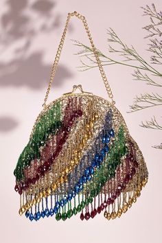 Multicolor Tassel Pouch Bag, Festive Gold Potli Bag With Tassels, Multicolor Beaded Pouch Bag, Multicolor Beaded Bag For Evening, Gold Beaded Bag For Festivals, Elegant Multicolor Potli Bag For Party, Embellished Multicolor Bags As Fashion Accessory, Embellished Multicolor Evening Bag, Multicolor Embroidered Party Bag