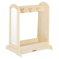 a wooden doll's dressing table with mirror and shelf for dolls in the shape of an arch