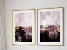 two framed art pieces hanging on the wall