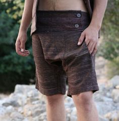 Handmade men's Raw Silk Harem shorts. Two side pockets  Elastic waist. Decorative front part with two buttons. These amazing handmade Raw Silk shorts are a perfect item for relaxed lifestyle. this casual outfit is soft, light and pleasant to wear .  COLORS Brown SIZING Waist circumference: S - 30.7"(78cm) stretch to 35.43"(90cm)*M 32.28"(82cm) stretch to 37.79"(96cm)*L31.49"(80cm) stretch to 38.58"(98cm) Length S 18.5"(47cm) Inner leg 6.69"(17cm) *M 19"/48cm Inner leg 8.26" FABRIC  Raw Silk Coco Mens Boho Large Jean Shorts, Floral Shirt Outfit, Hippie Shorts, Harem Shorts, Hippie Pants, Festival Shorts, Mens Linen, Funky Fashion, Silk Shorts