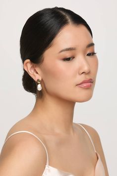 These bold pearl and gold drop earrings are perfect for your wedding day or any black-tie affair. Available in Gold. Shop Birdy Grey! Complete with an oversized pearl, these drop earrings will turn heads. | Gold Jewelry | Birdy Grey Amalfi Baroque Pearl Drop Earrings Pearl Drop Earrings Gold, Birdy Grey, Gold Shop, Black Tie Affair, Gold Drop Earrings, Pearl Drop Earrings, Pearl Drop, Baroque Pearls, Birdy