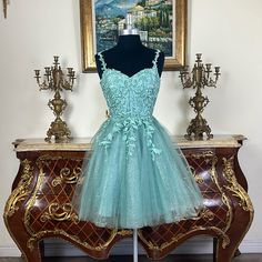 Green Color Tulle Glitter Fabric Three Layers Built In Petticoat Homecoming Dresses Cowgirl, Tiffany Blue Dress Short, Teal Dama Dresses, Short Teal Dress, Prom And Hoco Dresses, Turquoise Hoco Dress, Teal Hoco Dress, Winter Homecoming Dresses, Modest Hoco Dresses