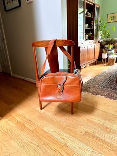 A 1970's Vinyl shoulder bag  ~ Brown marbled vinyl exterior with adjustable shoulder strap  ~ Nice metal zipper with latch  ~ Four plastic feet  ~ Adjustable shoulder strap  ~ 2 large exterior pockets, one with a zipper and one with buckle   ~ Bag is in amazing vintage condition (minor wear) ~Measurements  ~Approximately 10" tall x 16 1/2" long x 6 3/4" wide base ~Bag has endless possibilities ----------------------------------------------------------  Convo for INTERNATIONAL SHIPPING QUOTES ~ Always Happy To Ship Anywhere  Please See Shop Policies Prior To Purchase  ---------------------------------------------------------- Stop By The Shop - www.etsy.com/shop/RustynailSalvageCo Visit Our Sister Shop for Vintage Threads- www.etsy.com/shop/ArsenicandOldLacevtg ----------------------------- Vintage Satchel With Zipper Closure, Vintage Satchel With Zipper Closure For Travel, Vintage Rectangular Satchel With Zipper Closure, Vintage Crossbody Satchel With Zipper Closure, Mid-century Satchel Shoulder Bag For Travel, Mid-century Brown Shoulder Bag For Travel, Retro Travel Satchel With Zipper Closure, Retro Shoulder Bag With Zipper Closure, Mid-century Satchel Bags For Travel