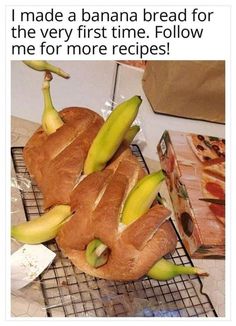 a sandwich with bananas on it sitting on top of a cooling rack