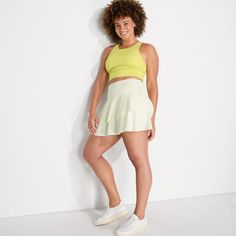 Embrace the sun and surf with elegance in the Lands' End Women's Chlorine Resistant High Waisted Tulip Hem Swim Skort. This piece combines style and functionality perfectly for your beach days or poolside relaxation.

- Size: Small
- Color: Egret White
- Material: Chlorine-resistant fabric
- Gender: Female
- Features: High-waisted design, built-in shorts for full coverage, tulip hemline for a stylish flair, four convenient pockets (two on the skirt and two on the shorts)

Designed for both activ Athleisure Swim Skirt With Built-in Shorts For Summer, Spring Gym Skort With Built-in Shorts, Summer Athleisure Skort For Workout, Summer Athleisure Tennis Skirt, Summer Workout Skort, Spring Poolside Athletic Shorts, Spring Athleisure Tennis Skirt With Built-in Shorts, Athleisure Tennis Skirt With Built-in Shorts For Spring, Summer Stretch Activewear