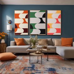 a living room filled with furniture and paintings on the wall above it's coffee table