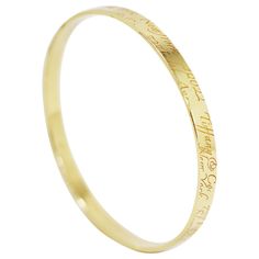 Etched Yellow Gold Bangle For Anniversary, Classic Stamped Round Bangle, Gold Engraved Bangle For Anniversary, Engraved Gold Bangle Bracelet For Anniversary, Anniversary Etched Gold Bangle Bracelet, Gold Bangle With Engraved Text, Anniversary Engraved Gold Bangle Bracelet, 14k Stamped Round Bangle For Anniversary, Engraved Name Bangle Bracelet For Anniversary