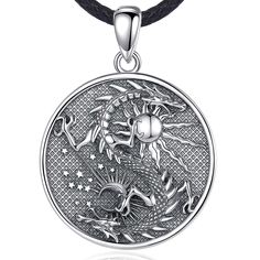 Dragon Pendant Vintage Sterling Silver Sun &amp; Moon Amulet Necklace Introduction Discover the captivating allure of our Dragon Pendant Vintage Sterling Silver Sun &amp; Moon Amulet Necklace. This exquisite piece merges the mythical power of dragons with the timeless elegance of sterling silver. Whether you're drawn to its intricate design or the symbolism it carries, this amulet is a must-have for those who appreciate fine craftsmanship and spiritual jewelry. Product Features: High-Quality Material: Crafted from 925 Sterling Silver, this pendant is durable, hypoallergenic, and resistant to tarnishing. Unique Design: The pendant features a beautifully detailed dragon encircling the sun and moon, symbolizing balance and power. Chain Options: Available with an 18-inch or 20-inch ste Luxury Sterling Silver Jewelry With Dragon Design, Luxury Spiritual Necklaces Tarnish Resistant, Moon Amulet, Power Chain, Pentacle Jewelry, Dragon Wolf, Gothic Pendant, Vintage Sterling Silver Jewelry, Wolf Necklace