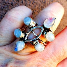 Brand New Handmade Rainbow Moonstone Silver Ring. Size 8 1/2 New To Poshmark? Use Referral Code Kimberlyn222 To Receive $10. Adjustable Moonstone Ring With Moon Phase, Moonstone Rings With Moon Phase Design, Moon Phase Moonstone Rings, White Moonstone Open Ring, Healing Moonstone Ring With Natural Stones, Spiritual Moonstone Crystal Ring, Unique Adjustable White Moonstone Ring, Adjustable White Moonstone Ring, White Moonstone Celestial Ring In Moon Shape