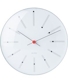 a large white clock with red hands and numbers on the face is shown against a white background