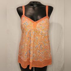 New With Tags! - Brand: American Eagle - Color: Peach (Light Orange) With Light Blue/Yellow Small Floral Pattern - Style: Spaghetti Strap Babydoll Tank Top With Adjustable Length Straps Super Cute And Comfy For Your Spring Break Or Summer Wardrobe! Orange Cotton Summer Sleepwear, Orange Cotton Sleepwear For Summer, Yellow Tank Top With Built-in Bra For Spring, Multicolor Sleeveless Tank Top For Loungewear, Orange Spaghetti Strap Camisole For Summer, Orange Spaghetti Straps Camisole For Summer, Orange Sleeveless Camisole For Spring, Fitted Orange Camisole For Summer, Spring Cotton Sleepwear With Adjustable Straps