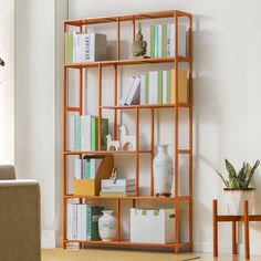 a living room with a book shelf filled with books