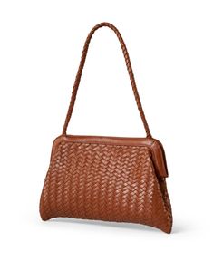 A chic new style from Bembien, the Le Sac is a sophisticated shoulder bag that is ideal for everyday wear. It features a woven leather exterior, a magnetic closure, and a small interior pouch to keep you organized on-the-go. Slip the Le Sac through your arm for rooftop gatherings under the stars or wear it with your favorite occasionwear for an easy daytime look. Everyday Rectangular Shoulder Bag With Intrecciato Weave, Formal Tote Shoulder Bag With Woven Leather, Modern Clutch Bag With Braided Handles, Formal Woven Leather Tote Shoulder Bag, Rectangular Intrecciato Shoulder Bag For Everyday Use, Classic Woven Leather Bags, Classic Brown Shoulder Bag With Woven Leather, Classic Intrecciato Weave Shoulder Bag For Daily Use, Formal Brown Woven Leather Shoulder Bag