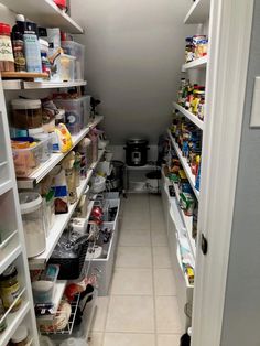 an open pantry with lots of food in it