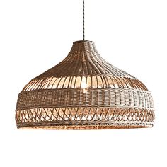 a light that is hanging from a wire on a white wall and has a rattan pattern