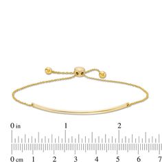 Simply sophisticated, this bar bolo bracelet pairs well with any attire. Crafted in warm 10K gold, this chic look features a sleek curved bar at the center. Polished to a bright shine, this bracelet adjusts up to 9.5 inches in length and secures with a bolo clasp and ball ends. Formal Adjustable Gold Bracelet, Tarnish Resistant, Formal Gold-plated Flexible Bracelets, Formal 14k Gold-filled Yellow Gold Bracelet, Flexible Yellow Gold Bracelet - Fine Jewelry, Flexible Yellow Gold-plated Chain Bracelet, Bolo Bracelet, Curved Bar, Peoples Jewellers, Chic Look