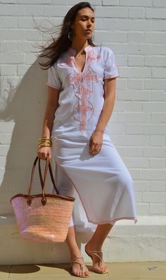 This Boho Kaftan Caftan is so cozy, it's definately idea for wearing during the weekend, or when you just want to relax at home. Although this caftan is really cozy, because the style is so elegant, it could be worn for an exotic night in, or when you want to wow your friends at your home party. Or wear it outdoors with boots, and look super bohemian! I live in London and in Marrakech. While I am in London, I always miss the exotic atmosphere of Marrakech. That's when I just bring out my comfy t White Short Sleeve Cover-up For Beach Party, White Short Sleeve Beachy Cover-up, Beach Season Wedding Dresses, Summer Wedding Tunic Kaftan, Summer Wedding Maxi Kaftan, White Beachwear Dress For Resort, Summer Wedding Maxi Length Kaftan, Summer Beach Embroidered Maxi Dress, Elegant Short Sleeve Kaftan For Summer