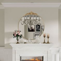 a fireplace in a living room with a mirror above it