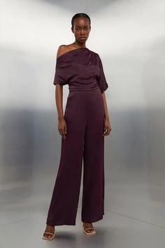 Viscose Satin Back Crepe Off Shoulder Jumpsuit | Karen Millen Elegant Satin Jumpsuit Or Romper In Solid Color, Elegant One-shoulder Jumpsuit For Party, Elegant Satin Jumpsuits And Rompers For Summer, Chic Satin Jumpsuits And Rompers In Solid Color, Chic Formal Satin Jumpsuits And Rompers, Chic Solid Color Satin Jumpsuits And Rompers, Elegant Satin Jumpsuits And Rompers For Party, Glamorous Off-shoulder Jumpsuits And Rompers For Party, Glamorous Satin Jumpsuits And Rompers For Evening