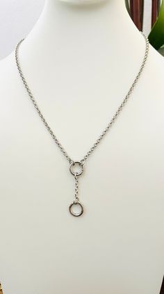 FREE SHIPPING! This is a beautiful Rhodium Plated Rolo Chain Necklace with Two Snap Ring Charm Holders  Rings open allowing you to customize your own necklace and wear with charms of your choice. All charms in my shop are also available for purchase. Available in your choice of custom length with 2 inch adjustable extender.  Drop chain length including charm holder is 1.5 inches.  May be worn without drop chain, giving you multiple options! 3mm Rolo chain.  Lobster clasp Absolutely stunning and so versatile! Silver Chain For Jewelry Making, Silver Minimalist Lariat Necklace With Lobster Clasp, Adjustable Link Sterling Silver Necklace, Silver Chain Lariat For Jewelry Making, Adjustable Sterling Silver Charm Necklace With Chain, Silver Lariat Stainless Steel Jewelry, Sterling Silver Lariat Necklace With Chain, Modern Lariat Chain Jewelry, Stainless Steel Jewelry With Silver Chain And Round Pendant