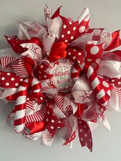 a red and white polka dot christmas wreath