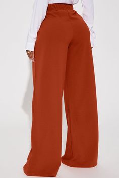 Available In Chocolate And Rust. Trouser Pant High Rise Button Detail Elastic Waist Back Front Pleats Wide Leg Stretch 95% Polyester 5% Spandex Imported | What Matters Most Wide Leg Trouser in Rust size Large by Fashion Nova Pant Trousers Women Outfit, Wide Leg Pants Outfit Work, Trousers Women Outfit, Pants Outfit Work, Pant Trousers Women, Modest Dresses Fashion, Wide Leg Pants Outfit, Corporate Wear, What Matters Most