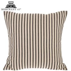 a black and white striped pillow on a white background